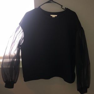 Top with puffy clear sleeves